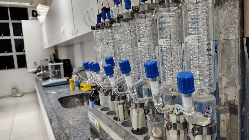 Rows of glass condensers on a modern laboratory bench